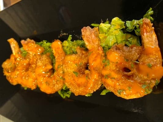 6 Fried Bang Bang Shrimp On A Bed Of Lettuce